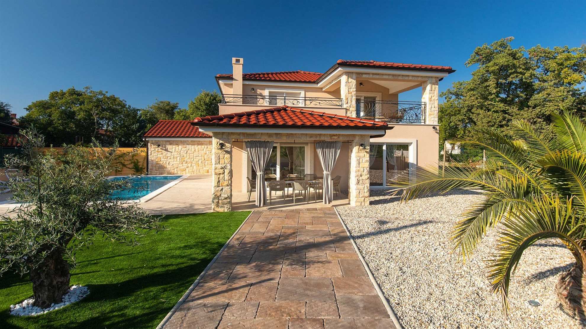 A modern poolside villa on the island Krk