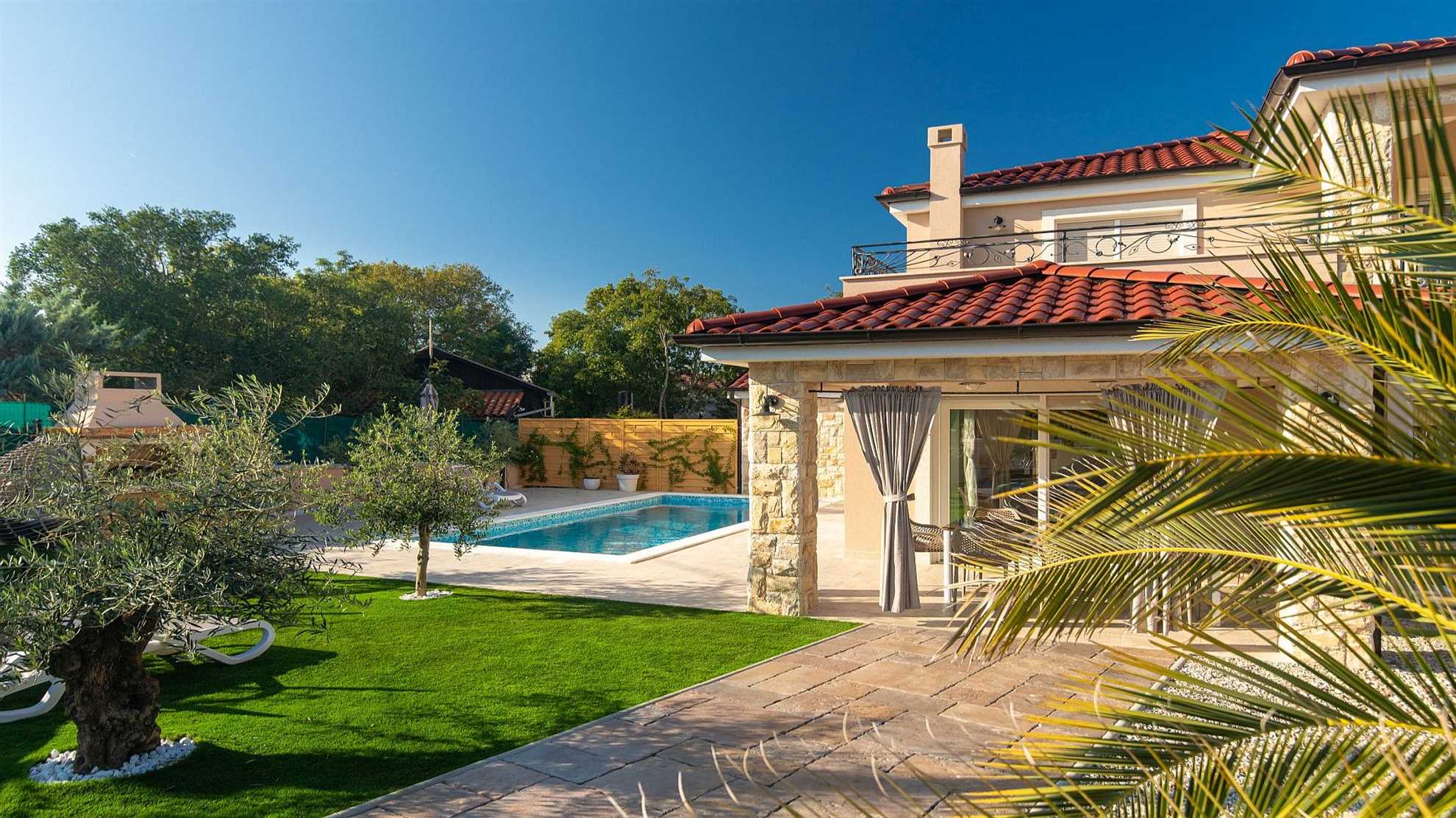 A modern poolside villa on the island Krk