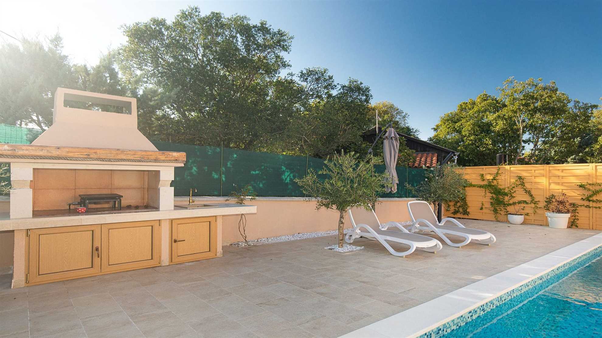 A modern poolside villa on the island Krk