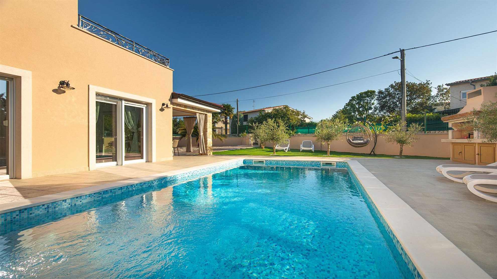 A modern poolside villa on the island Krk