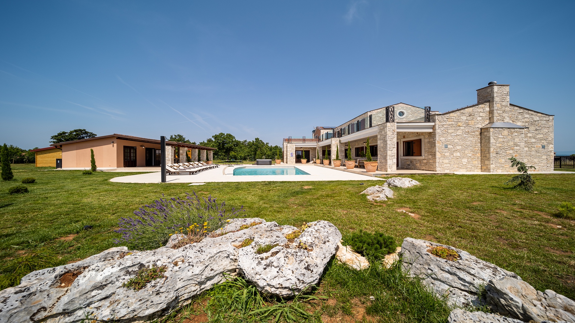 Luxurious poolside villa on spacious estate