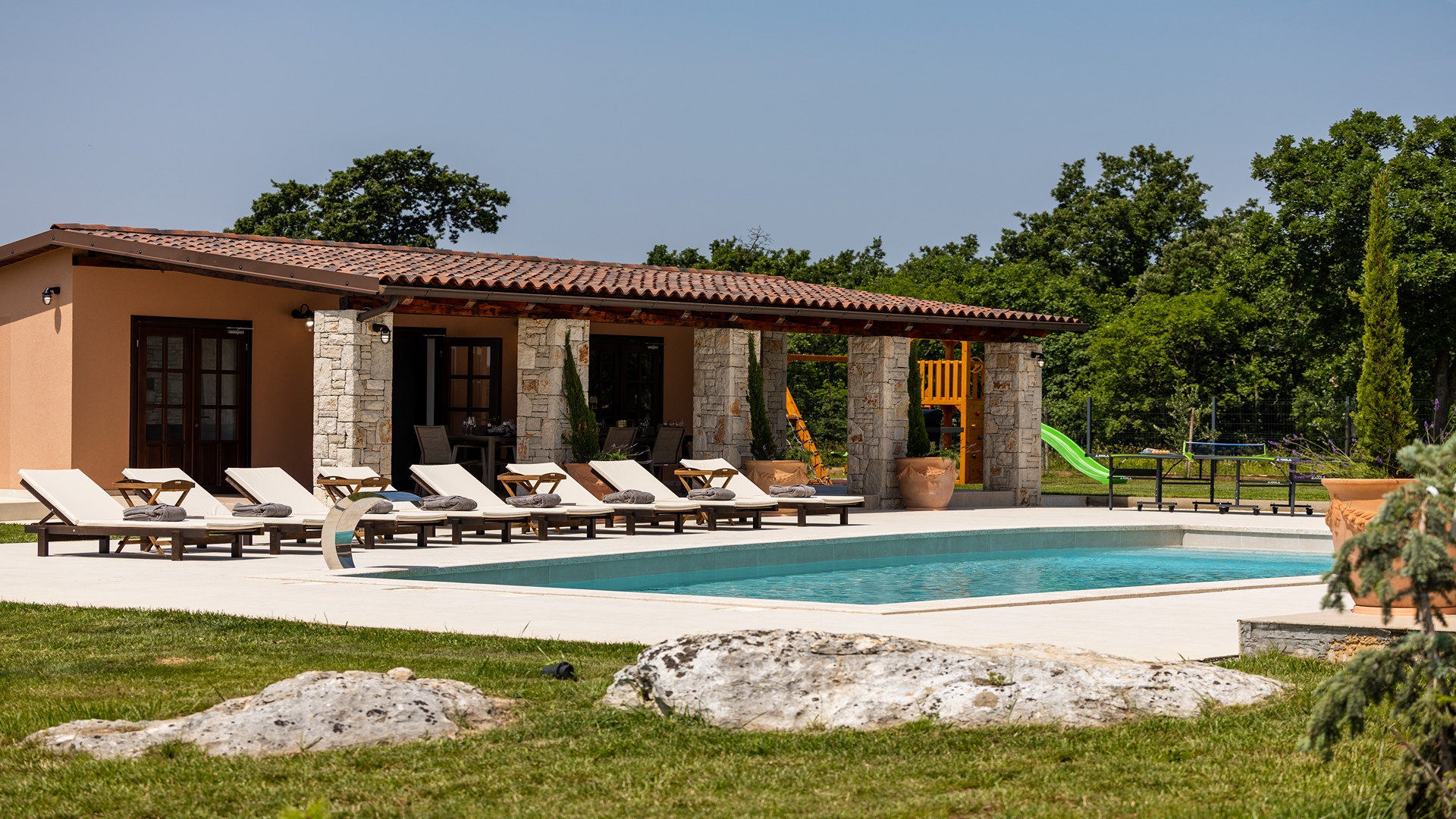 Luxurious poolside villa on spacious estate