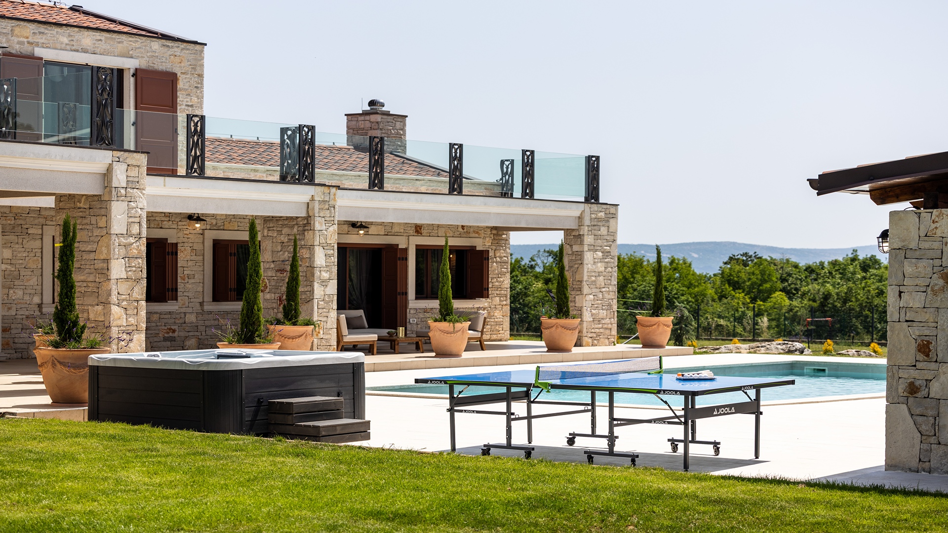 Luxurious poolside villa on spacious estate