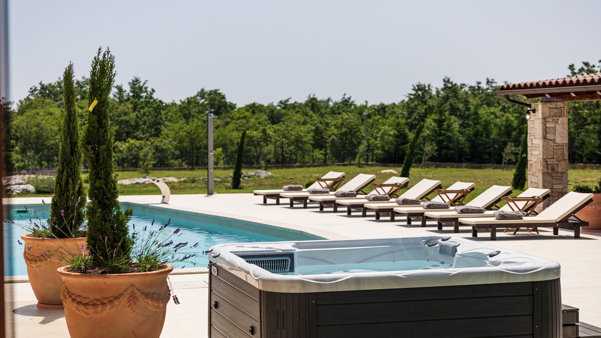Luxurious poolside villa on spacious estate