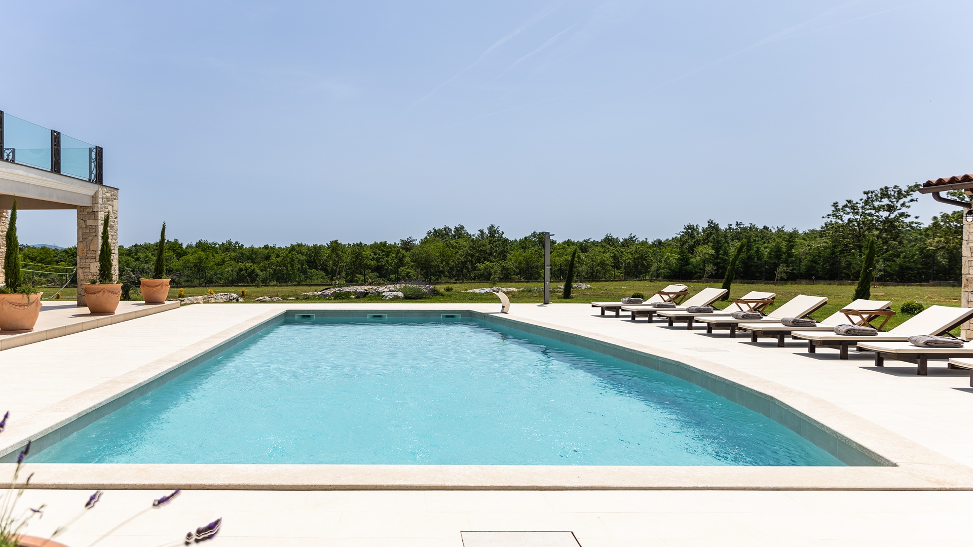 Luxurious poolside villa on spacious estate