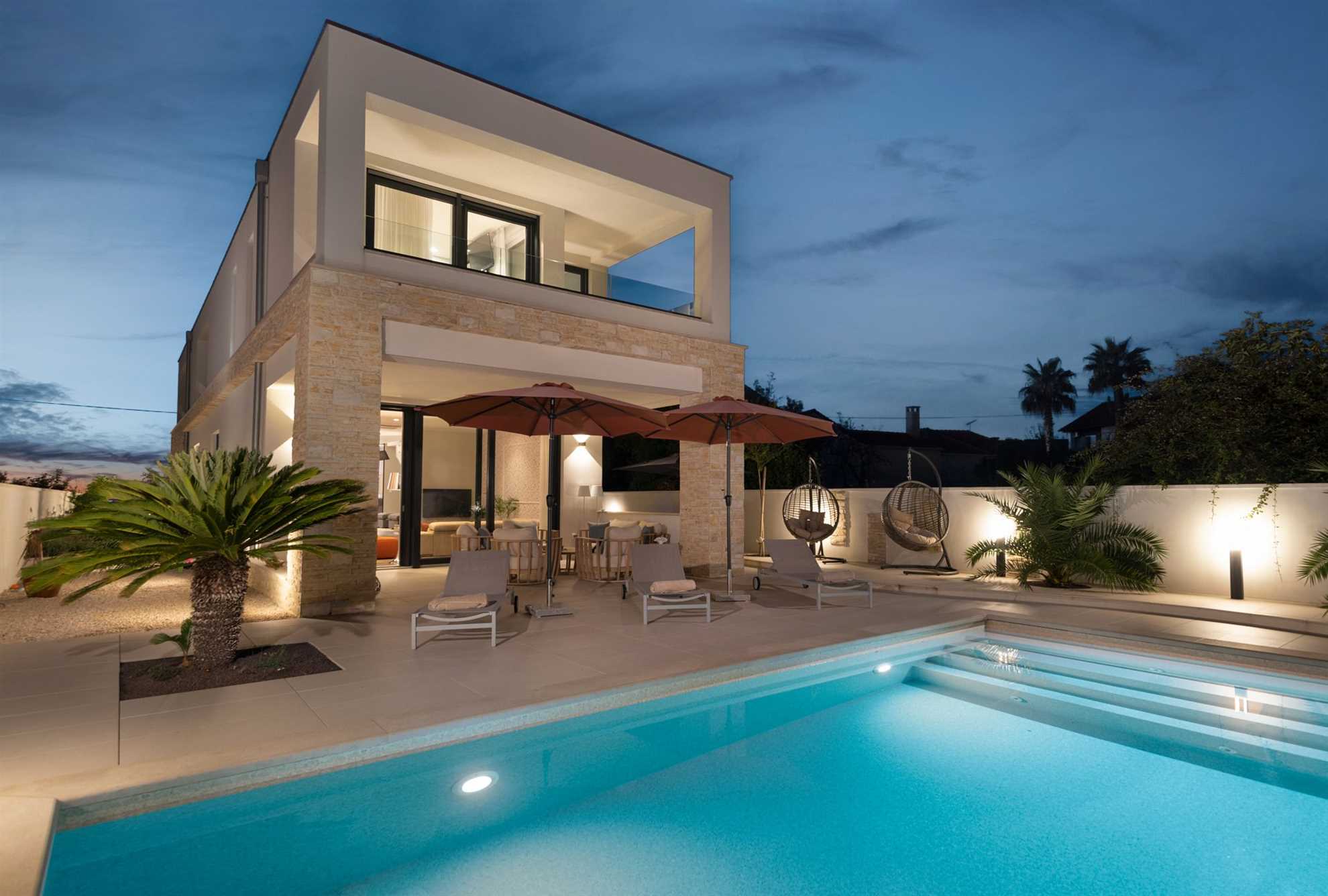 Luxurious beachfront villa with swimming pool