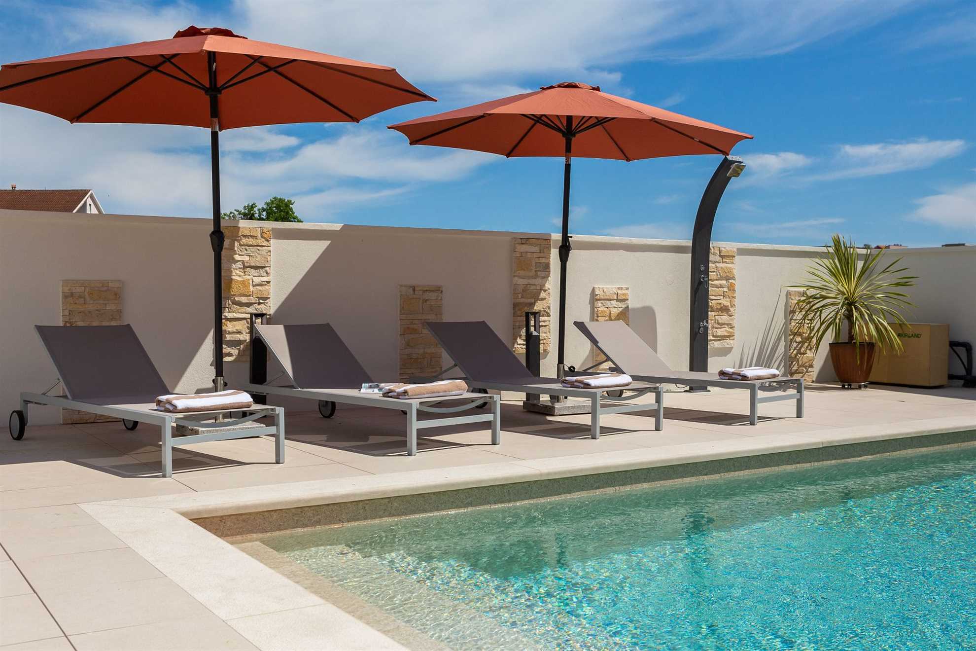 Luxurious beachfront villa with swimming pool