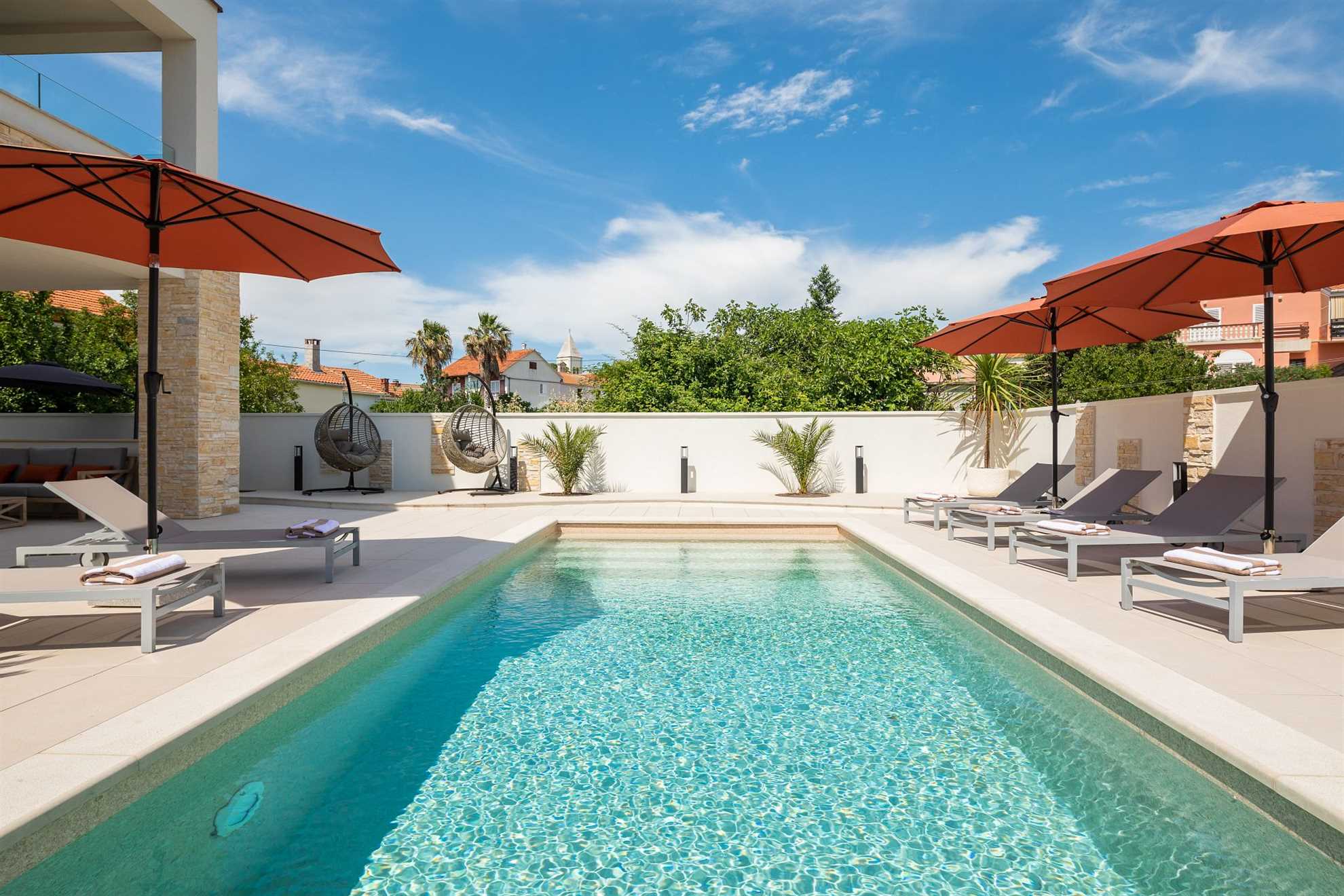 Luxurious beachfront villa with swimming pool