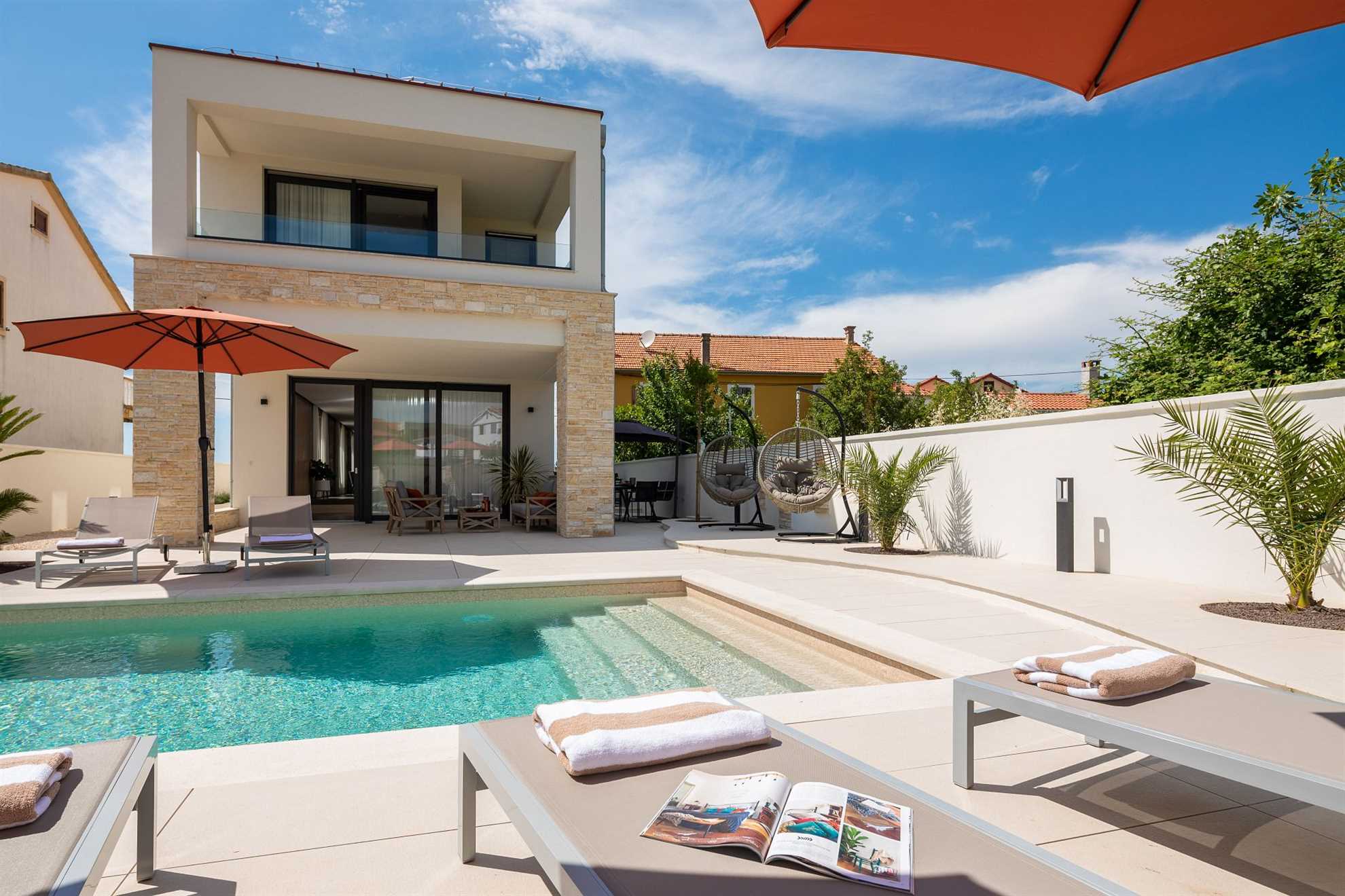 Luxurious beachfront villa with swimming pool
