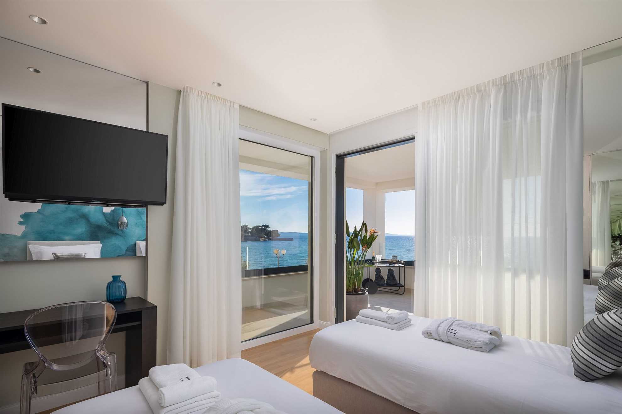 Luxurious beachfront villa with swimming pool