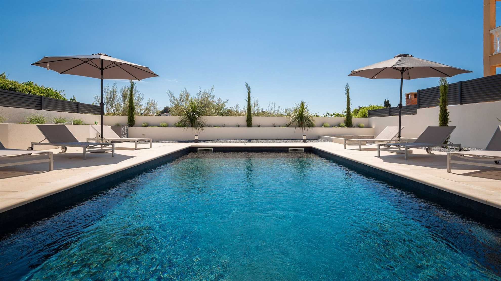Luxurious and modern poolside villa