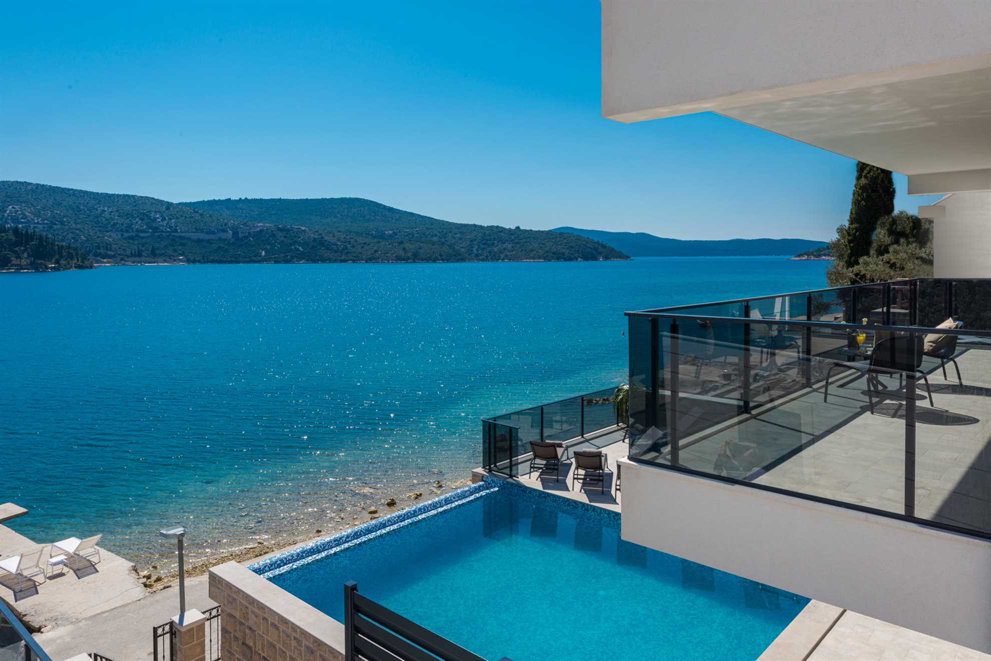 Beachfront Villa Absoluta with Pool