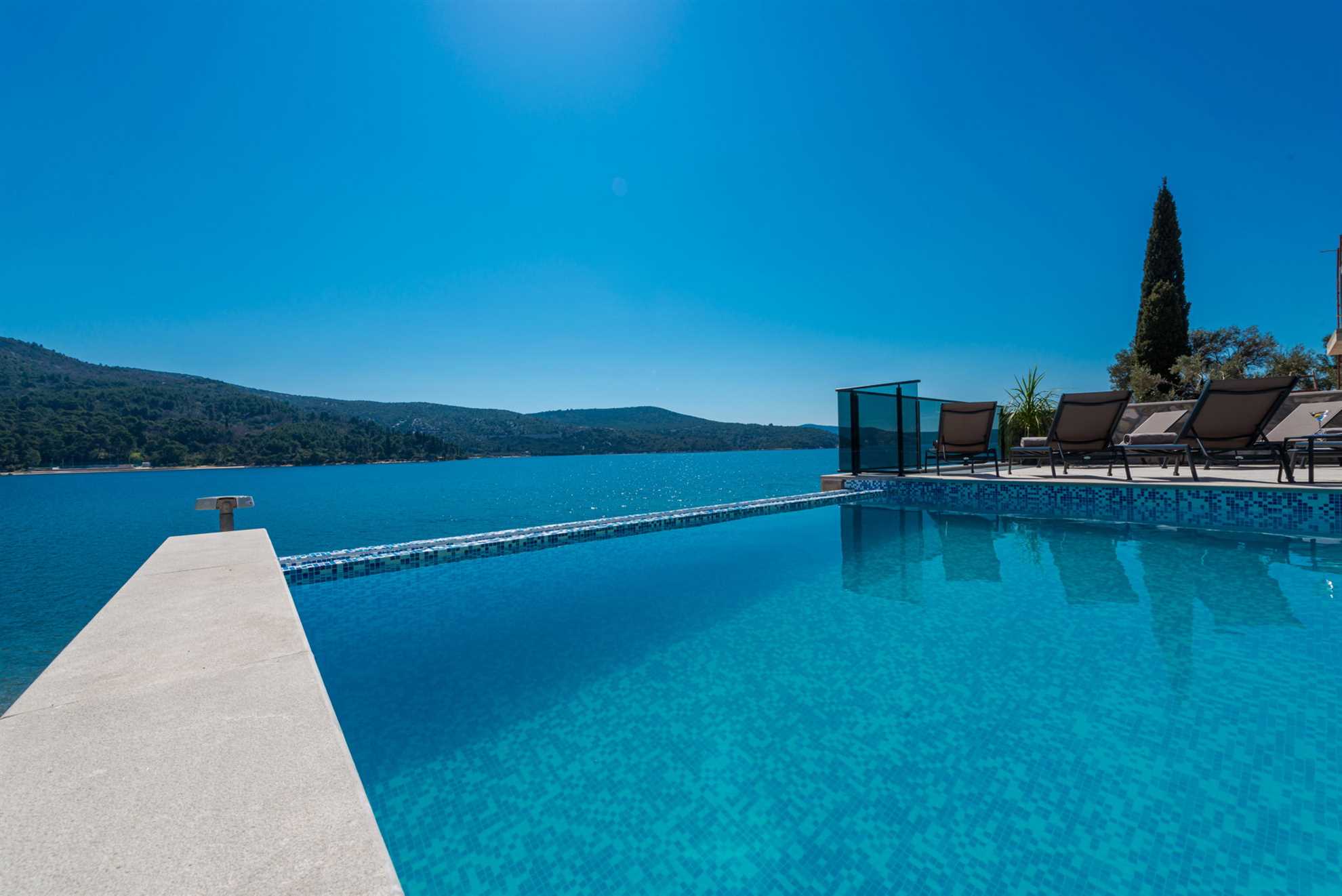 Beachfront Villa Absoluta with Pool