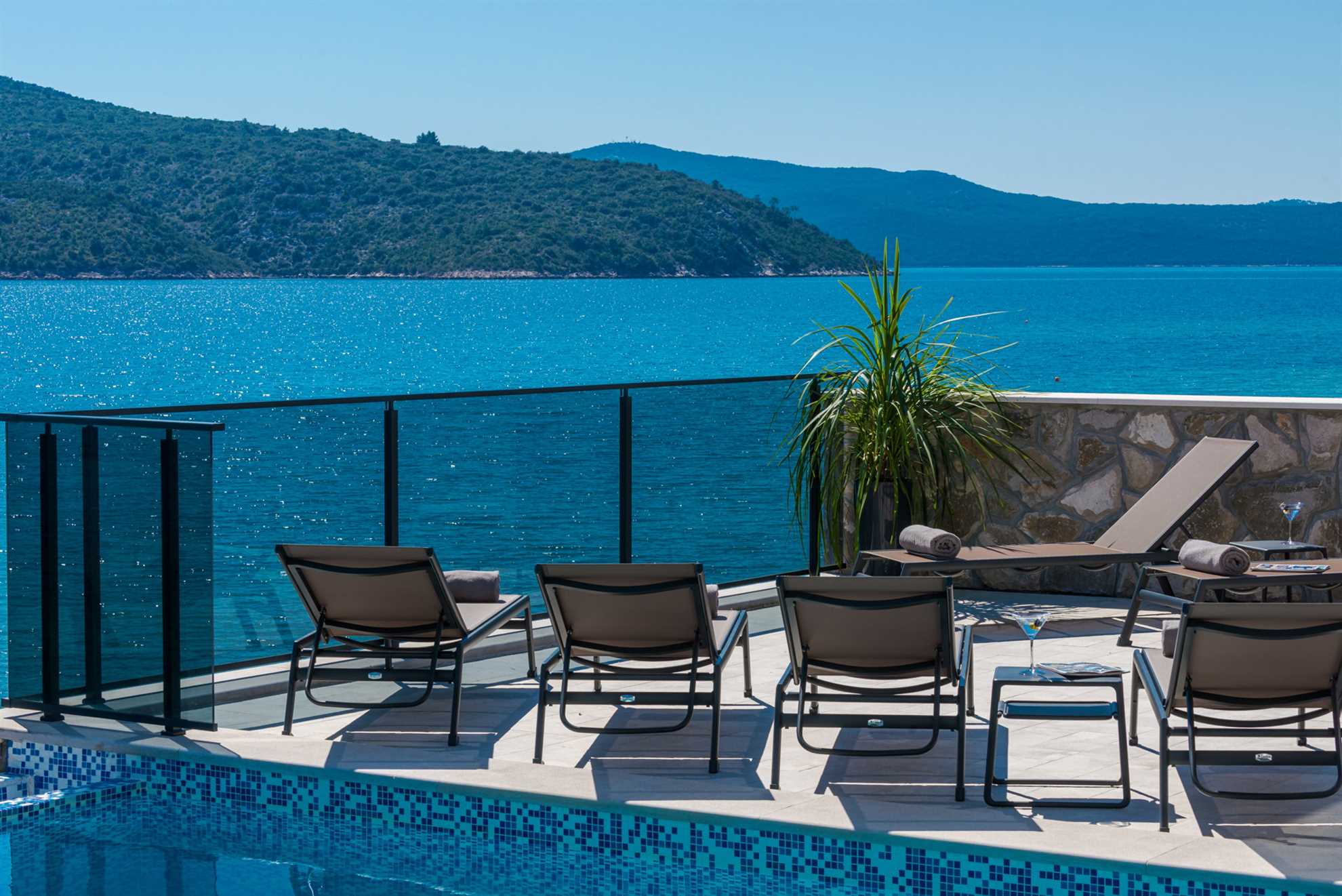 Beachfront Villa Absoluta with Pool