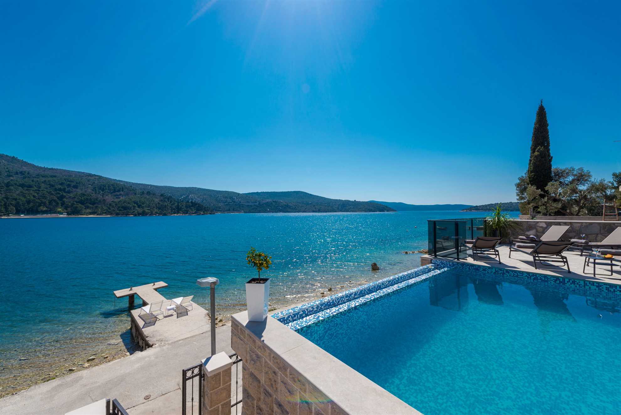 Beachfront Villa Absoluta with Pool