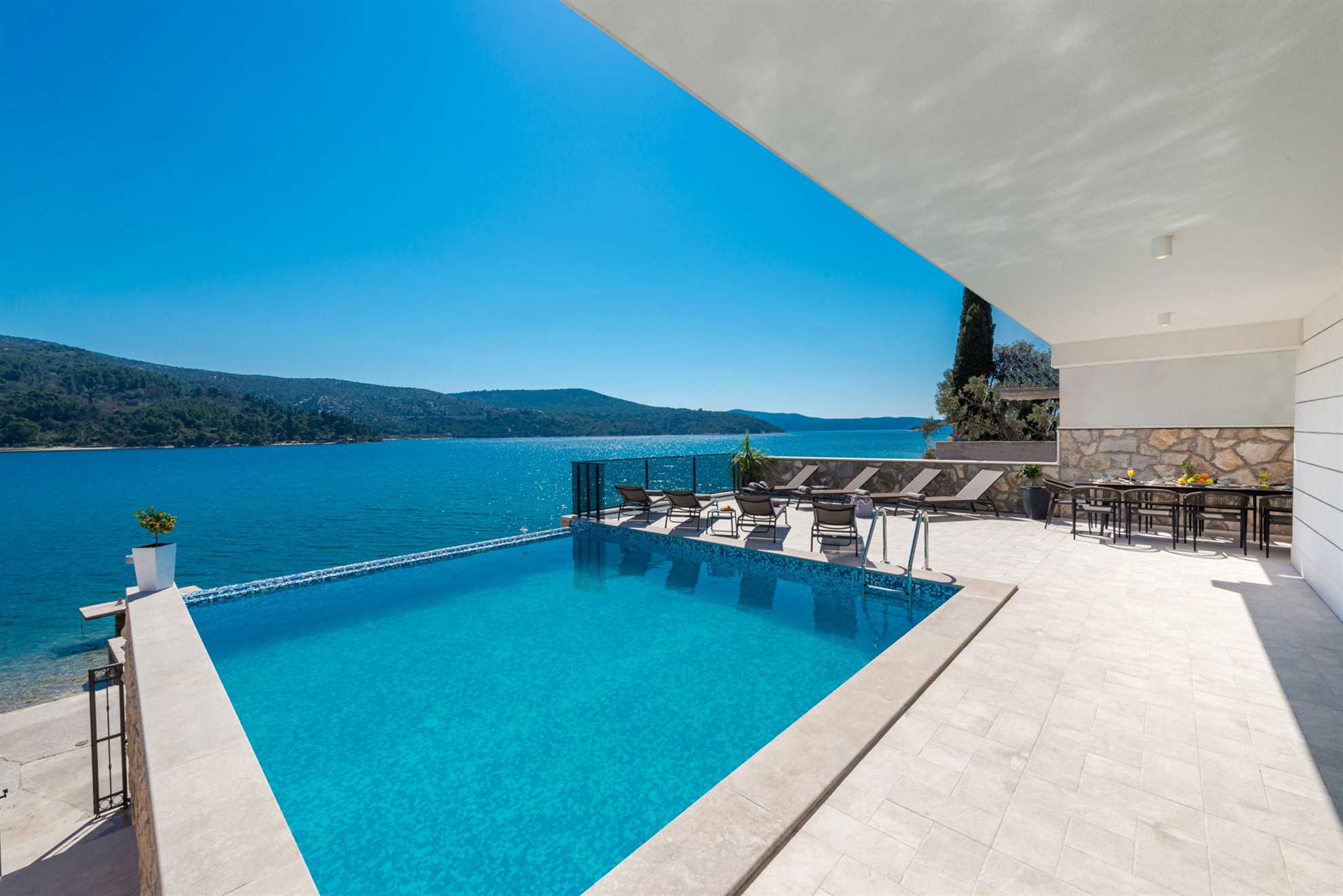 Beachfront Villa Absoluta with Pool
