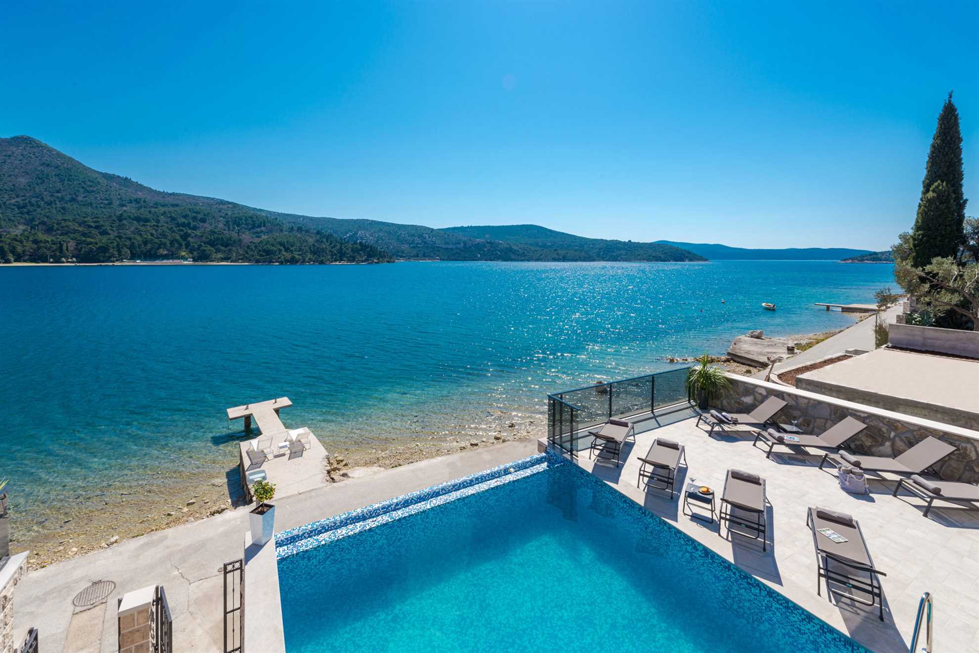 Beachfront Villa Absoluta with Pool