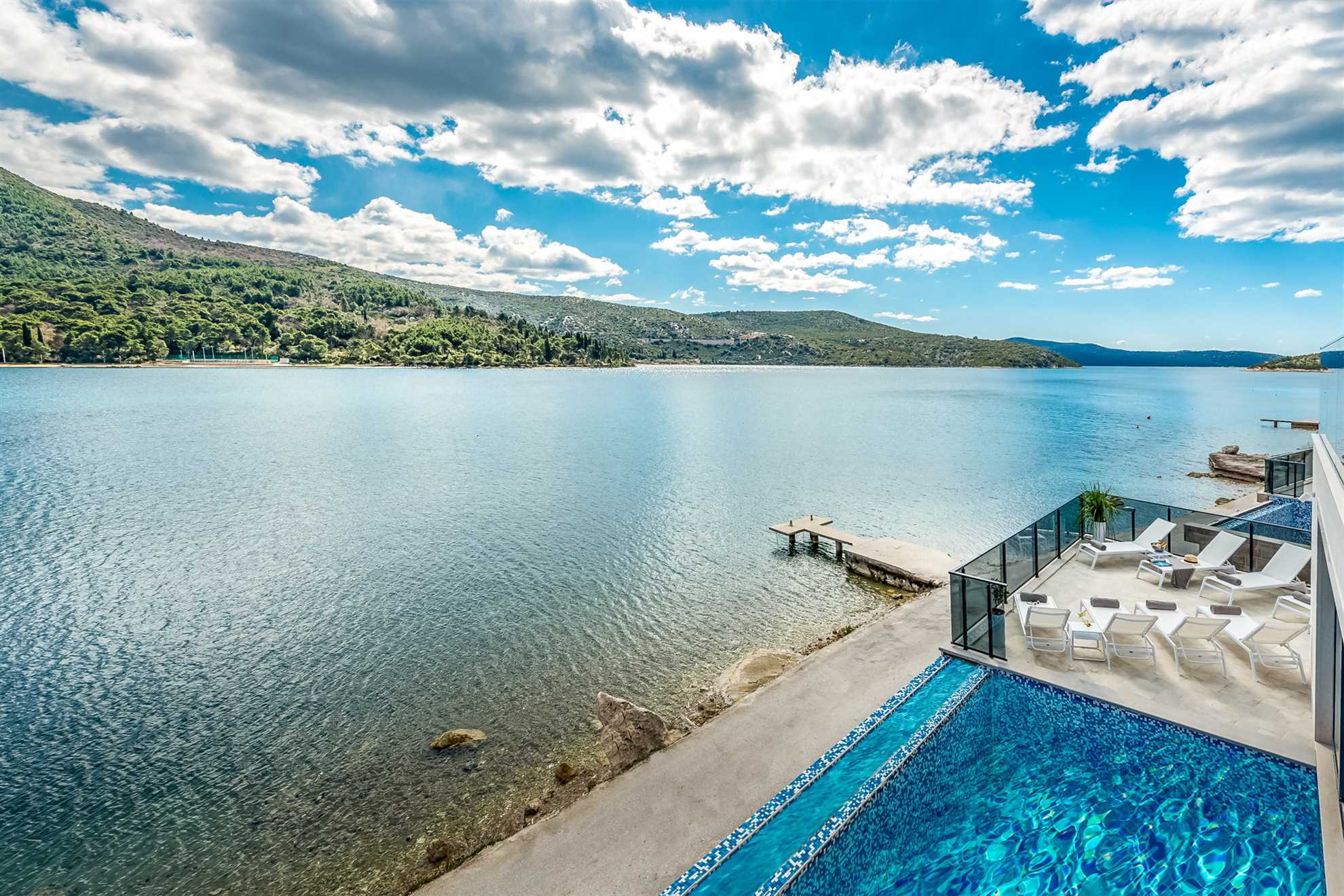 Beachfront Villa Suprema with Pool