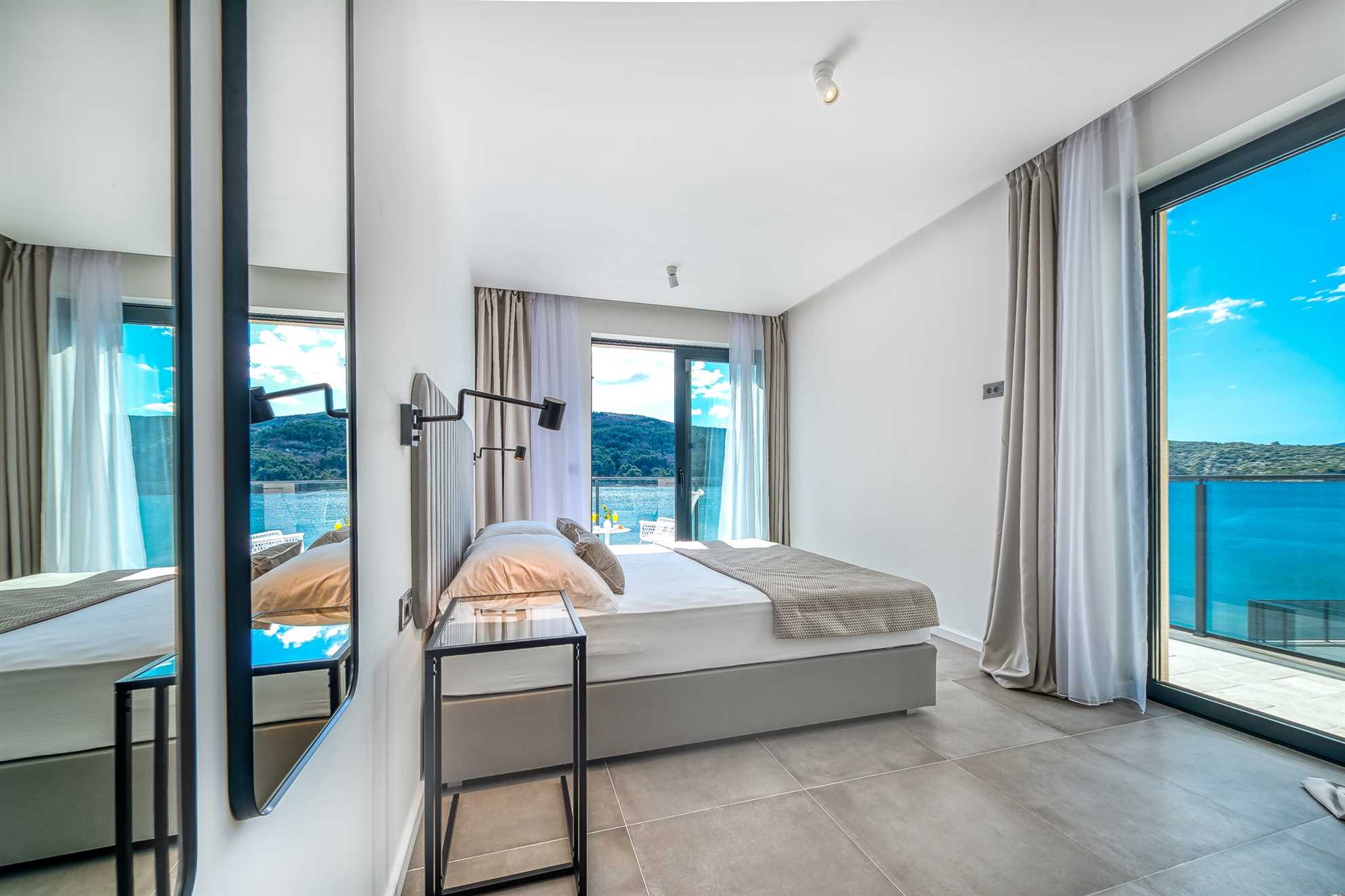 Beachfront Villa Suprema with Pool