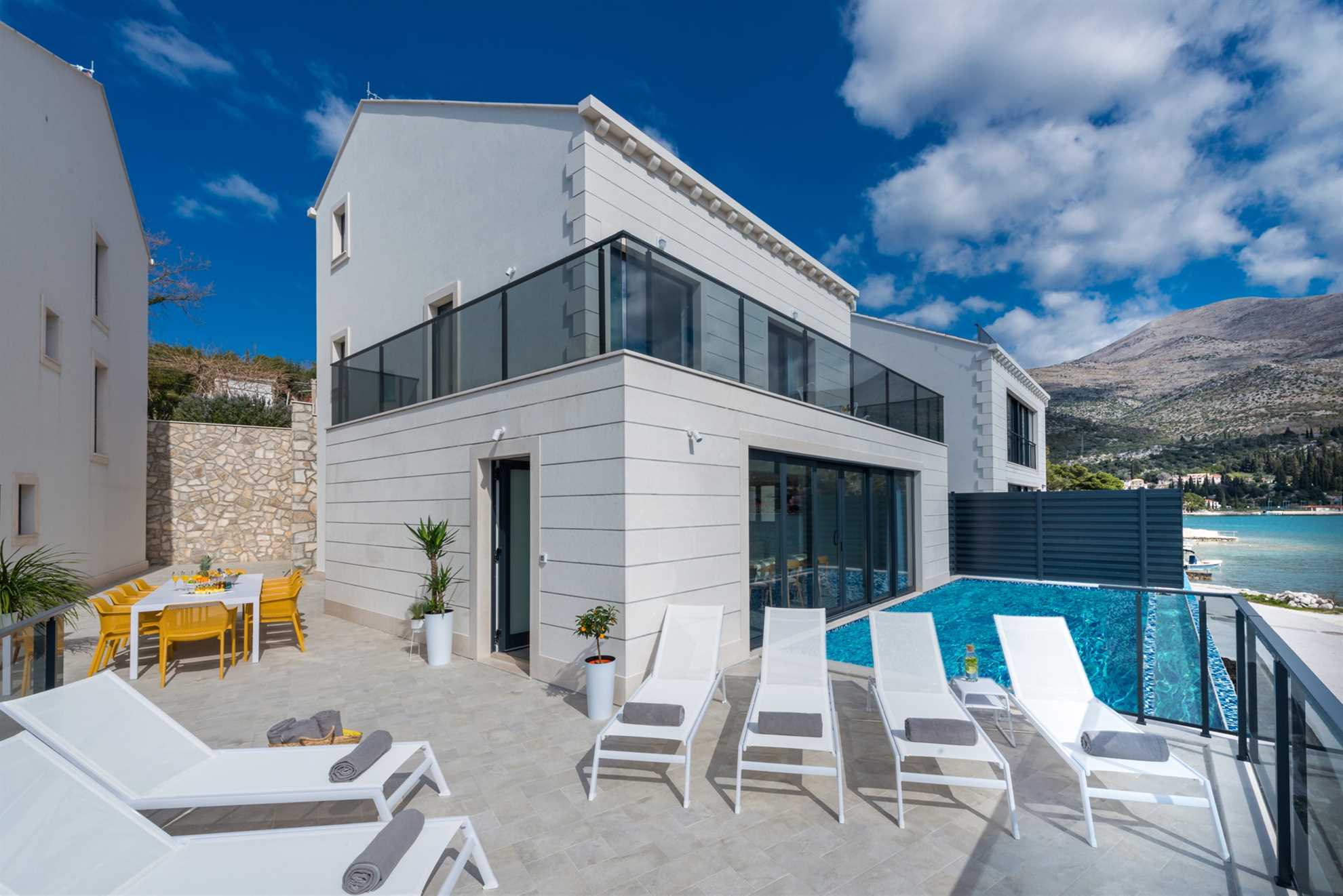 Beachfront Villa Suprema with Pool
