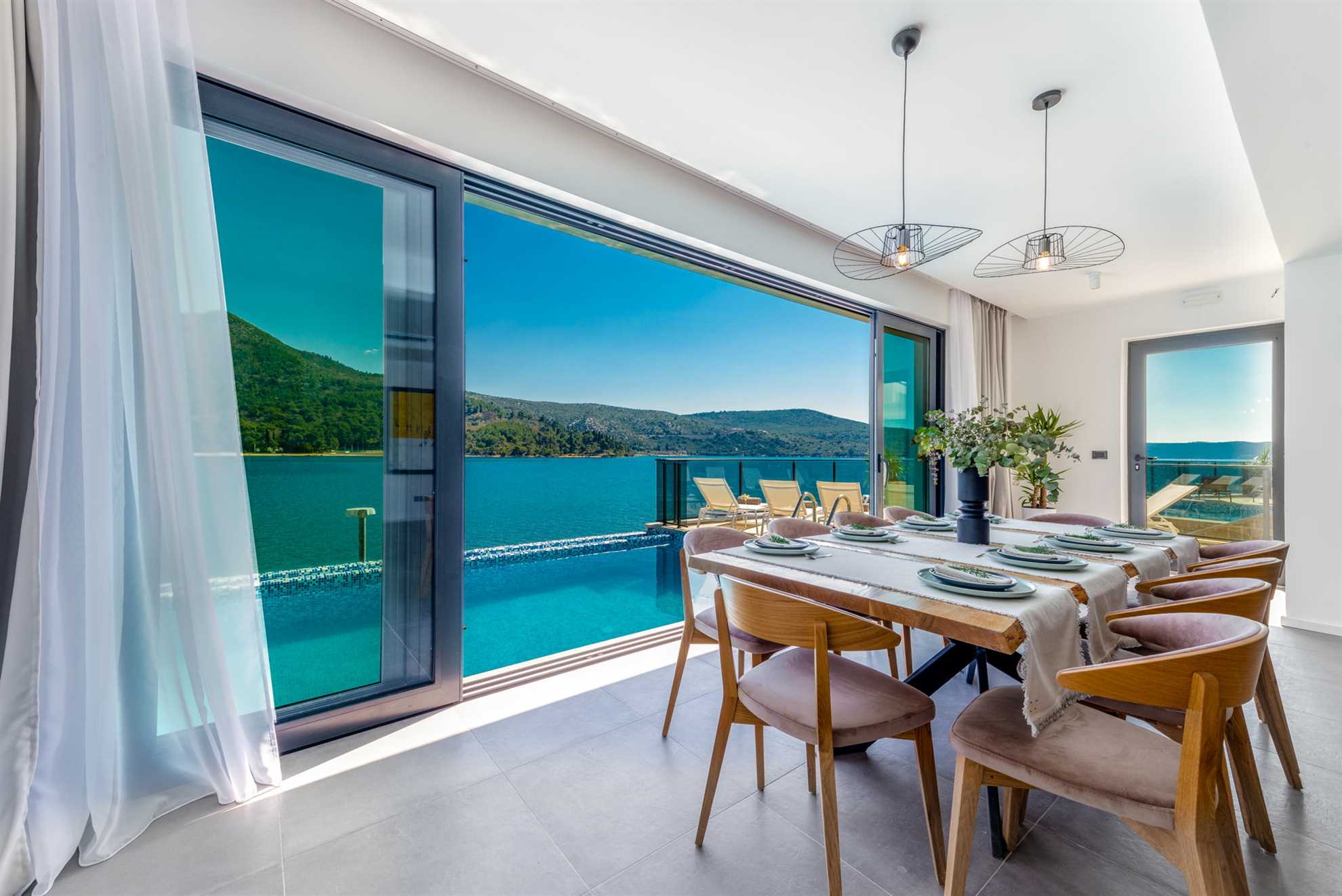 Beachfront Villa Suprema with Pool