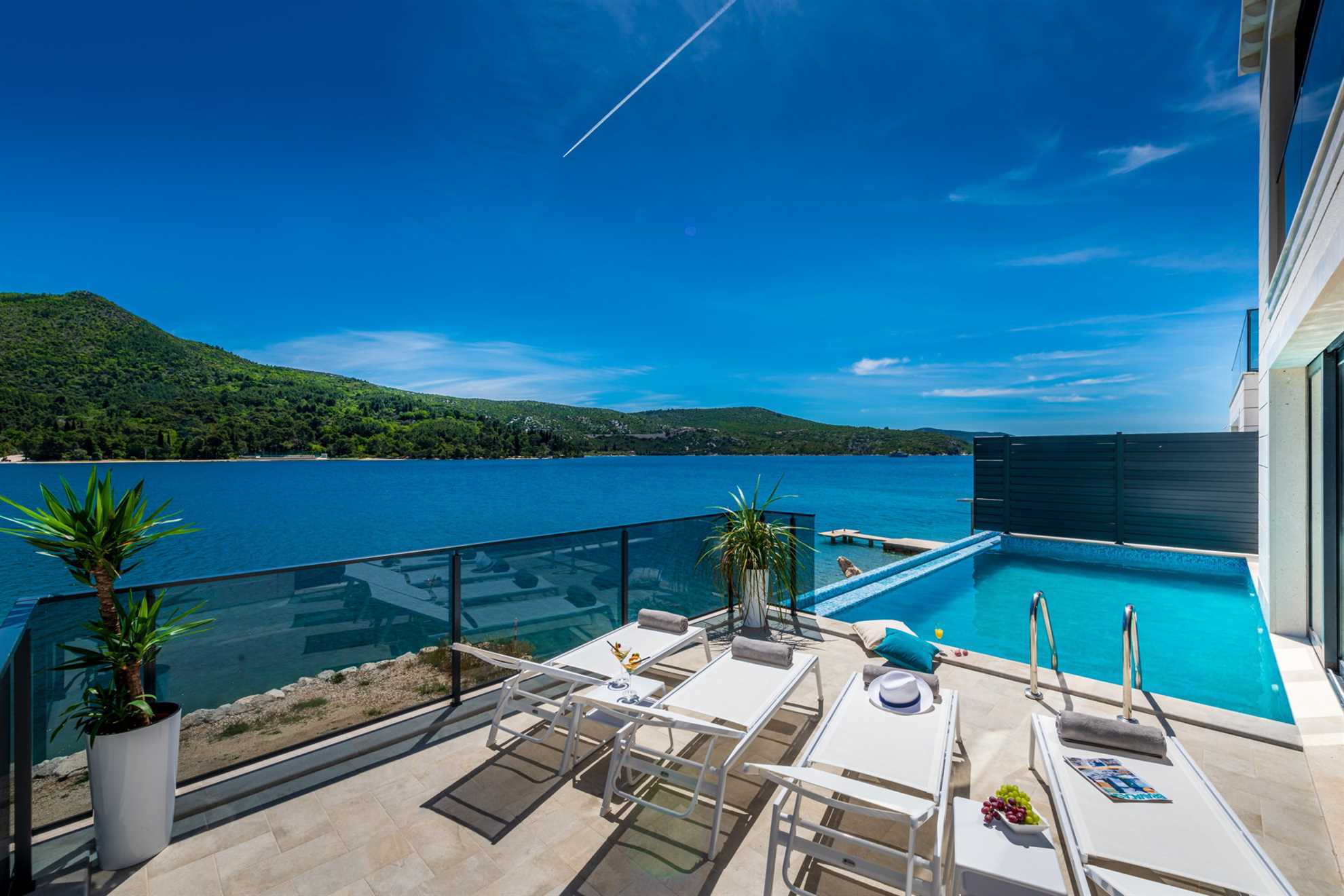 Image of Beachfront Villa Ultimata with Pool