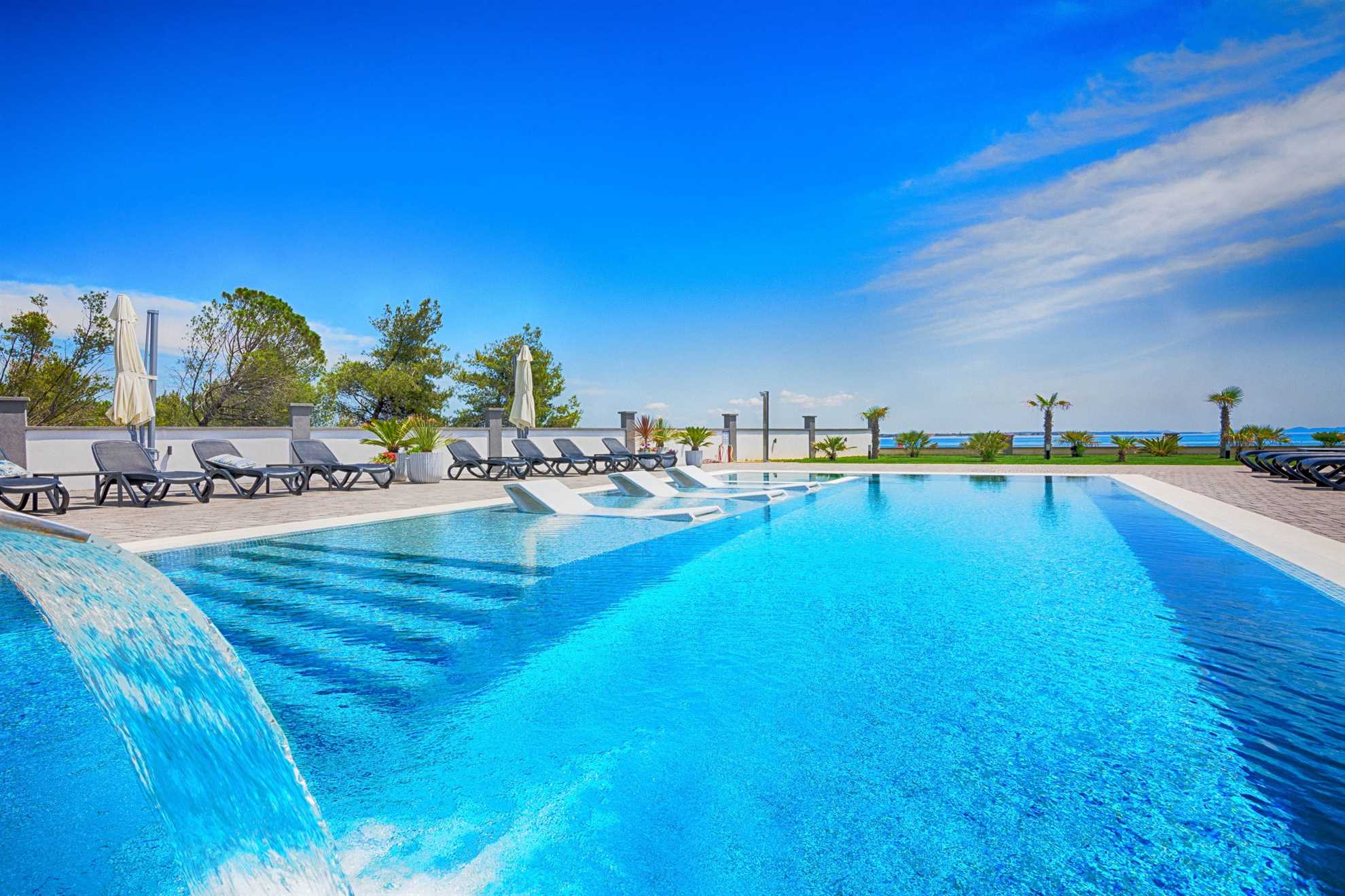 Apartment with pool | Sea view | quiet location | for 4 per.