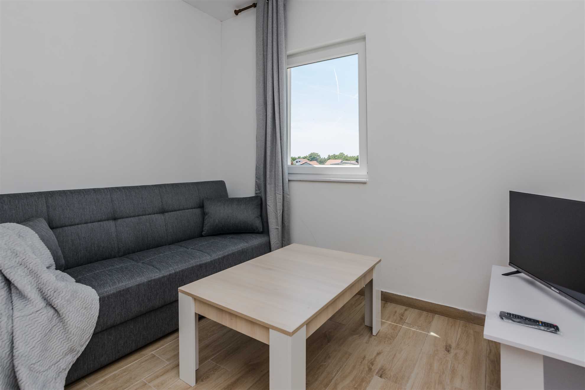 Partial sea view | WiFi, air conditioning, parking | for 4 persons